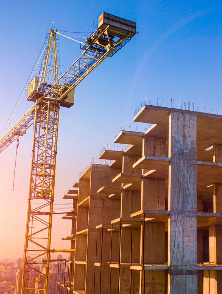 Builders constructing house foundation layout